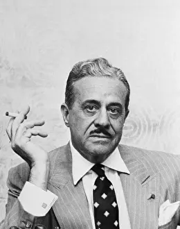 Designer Prints: Headshoulders Photo Of Loewy Smoking