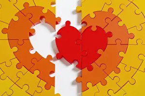 Broken Prints: Heart puzzle, in half, with whole centre