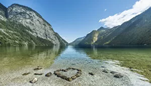Bank Gallery: Heart of stones in water, view over Lake Konigssee, Berchtesgaden National Park