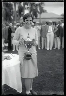 Helen Hicks Holding Golf Trophy
