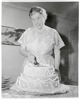 Helen Keller Cutting Cake