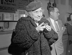 Helen Keller Holding Watch