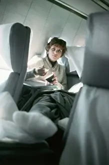 Helen Klaben Relaxing Aboard an Airplane