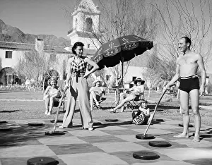 Helen Mack and George Stone Playing Lawn Checkers