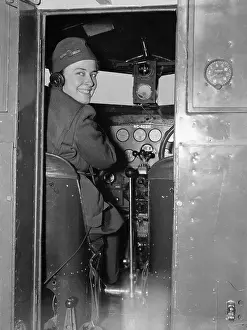 Helen Richey Sitting at the Controls of a Plane