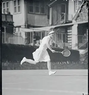 Helen Wills Playing Tennis