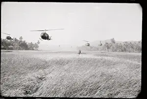 Bong Son Prints: Helicopter Hovering over Soldier in Rice Field