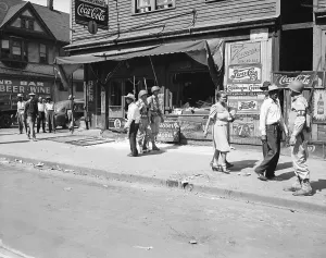 Advertising Sign Prints: Helmeted Soldiers Patrol Scene Of Riot
