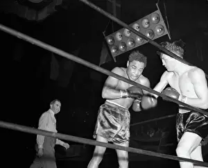 Eyes Closed Prints: Henry Armstrong Ducking Right Hook