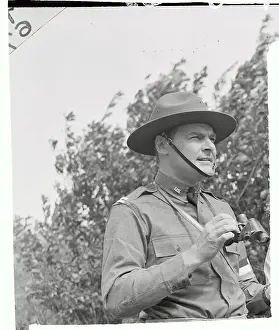 Henry Cabot Lodge Holding Binoculars