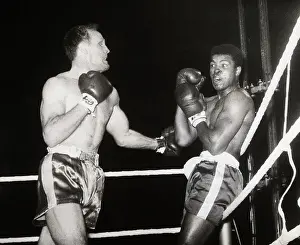 Henry Cooper Pinning Muhammad Ali on the Ropes