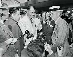 Henry and Edsel Ford Talking with Reporters