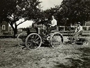 Henry Ford and Farmer Utilizing Tractor