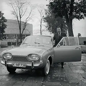 Bonn Prints: Henry Ford II Presenting New Ford Taurus