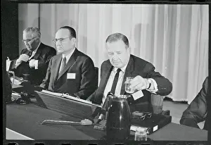 Henry Ford II Taking a Glass of Water
