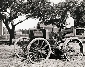 Henry Ford Sitting on Early Tractor