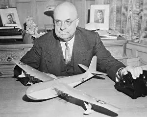 Henry J. Kaiser Admiring a Model Airplane