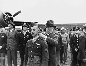 Henry L. Stimson Decorates An Airman, Circa 1942
