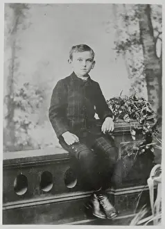 Henry Louis Menchken Sitting on Ledge