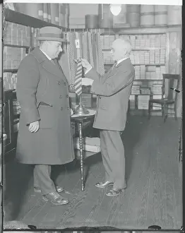 Henry Siegel Choosing a Necktie for Customer