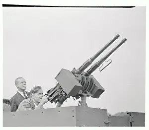 Patterson Prints: Henry Wallace Giving Gun a Close Inspection