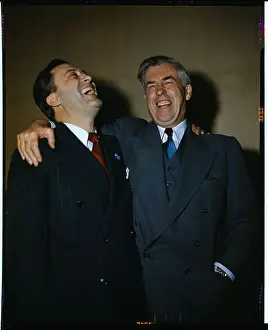 Henry Wallace and Glen Taylor Laughing and Embracing