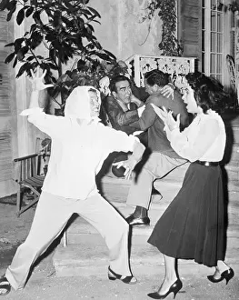 Hepburn Scowls At Taylor, Clift And Manki