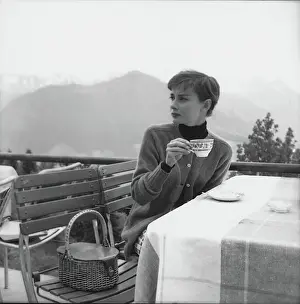 Prints of Belgian-born actress Audrey Hepburn (1929 - 1993) on the terrace of the Restaurant Hammetschwand at the summit of the Bürgenstock, Switzerland, circa 1955 Elegance Personified – A Classic Art Print Collection: Hepburn Takes Tea