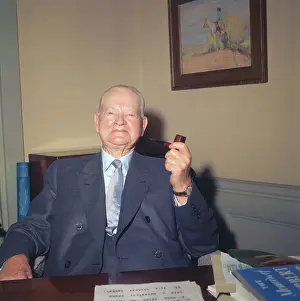 Herbert Hoover Holding a Pipe