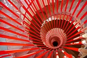 Railing Collection: High angle view of red spiral staircase