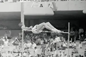 High Jumper Dick Fosbury Going over Bar