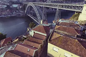 Douro River Prints: High view of ancient Ribera Distric of Porto and metallic Luis bridge