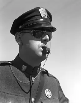 Risk Prints: Highway Patrolman In Uniform And Sunglasses Blowing His Whistle Without Use Of His Hands Badge Cap Chain Keystone