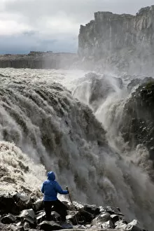 Tourist Gallery: Hiker at Dettifoss Waterfall, Joekulsargljufur, Iceland, Europe