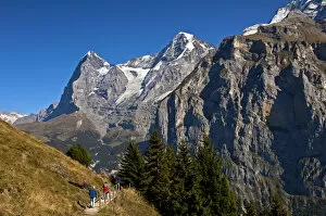 Images Dated 1st October 2011: Hikers at the foot of Eiger and Moench Mountains and Eiger glacier, Murren, Bernese Oberland