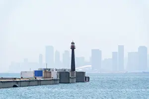Prints of Lighthouses Lighthouse Prints: Historical Lighthouse and Dalian Bay with City Skyline in Background