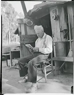 Santa Barbara Prints: Hobo Reading in His Shanty