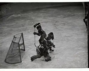 Prints of (Original Caption) Frozen Moments: A Journey Through Hockey History: Hockey Action Near the Goal