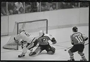 Hockey Action at The Net