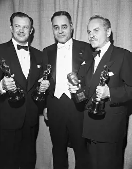 Joseph L Prints: Holding Oscars At The Academy Awards