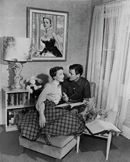 Hollywood Couple Sitting Together at Home