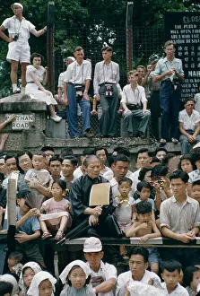 Prints of A procession along Nathan Road in Kowloon, Hong Kong, to celebrate the coronation of Queen Elizabeth II in London, June 1953. (Photo by Ed Feingersh/Michael Ochs Archives/Getty Images) Queen Elizabeth II Prints: Hong Kong Celebration