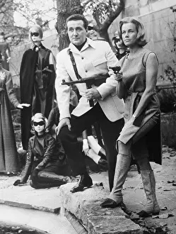 The Avengers 1961 Tv Show Prints: Honor Blackman Patrick Macnee Pose with Guns