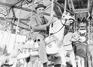Sydney Prints: Honorable W. M. Hughes Riding Carousel