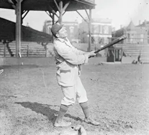 Prints of American baseball player Honus Wagner (1874 - 1955) of the Pittsburgh Pirates, swings a baseball bat on the field at West Side Grounds, Chicago, Illinois, 1909 MLB Legends Art Prints: Top 10 Greatest Baseball Players of All Time: Honus Wagner At Bat