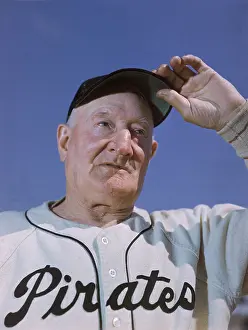 Prints of Portrati of American professional baseball player Honus Wagner (1874 - 1955) of the Pittsburgh Pirates touching the brim of his cap, late 1910s MLB Legends Art Prints: Top 10 Greatest Baseball Players of All Time: Honus Wagner Of the Pittsburgh Pirates