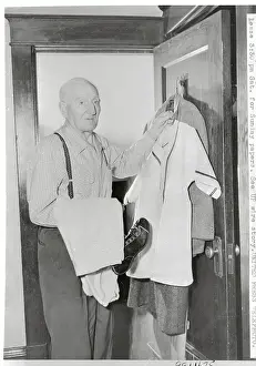 Honus Wagner Prints: Honus Wagner Putting Uniform Away