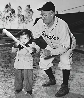 Honus Wagner Prints: Honus Wagner Teaching Small Boy Baseball