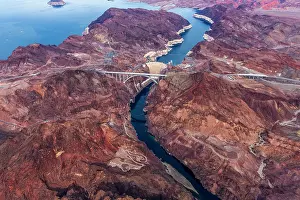 Prints of An aerial shot of the Hoover Dam and Lake Mead.Hoover Dam, is a concrete arch-gravity dam in the Black Canyon of the Colorado River, on the border between the U.S. states of Arizona and Nevada A Timeless Collection of Hoover Dam Photography: Hoover Dam Aerial