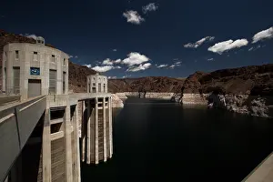 Prints of Located in Black Canyon on the Colorado River, at more than 700 feet tall Hoover Dam is an amazing Nevada spectacle, especially considering it was built more than 70 years ago A Timeless Collection of Hoover Dam Photography: Hoover Dam under a dramatic blue sky